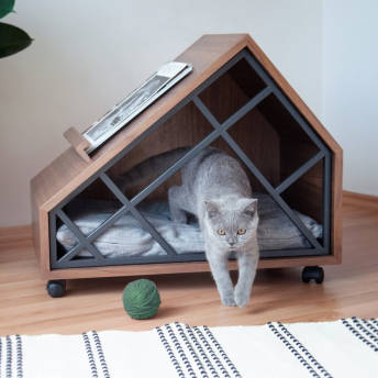 DesignKatzenhhle aus Holz mit feststellbaren Rollen - 51 originelle Geschenke für Katzenfreunde (und ihre Katzen)
